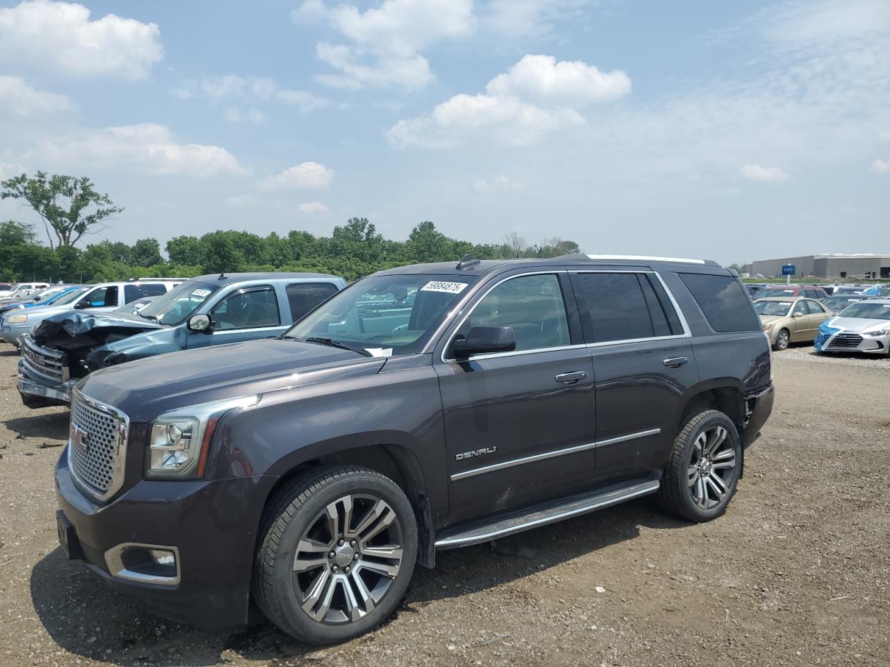 2017 GMC Yukon Denali, VIN 1GKS2CKJ2HR189482 — Rear end