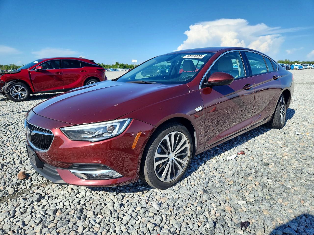 2019 Buick Regal Essence, VIN W04GP6SX1K1076292 — Бок