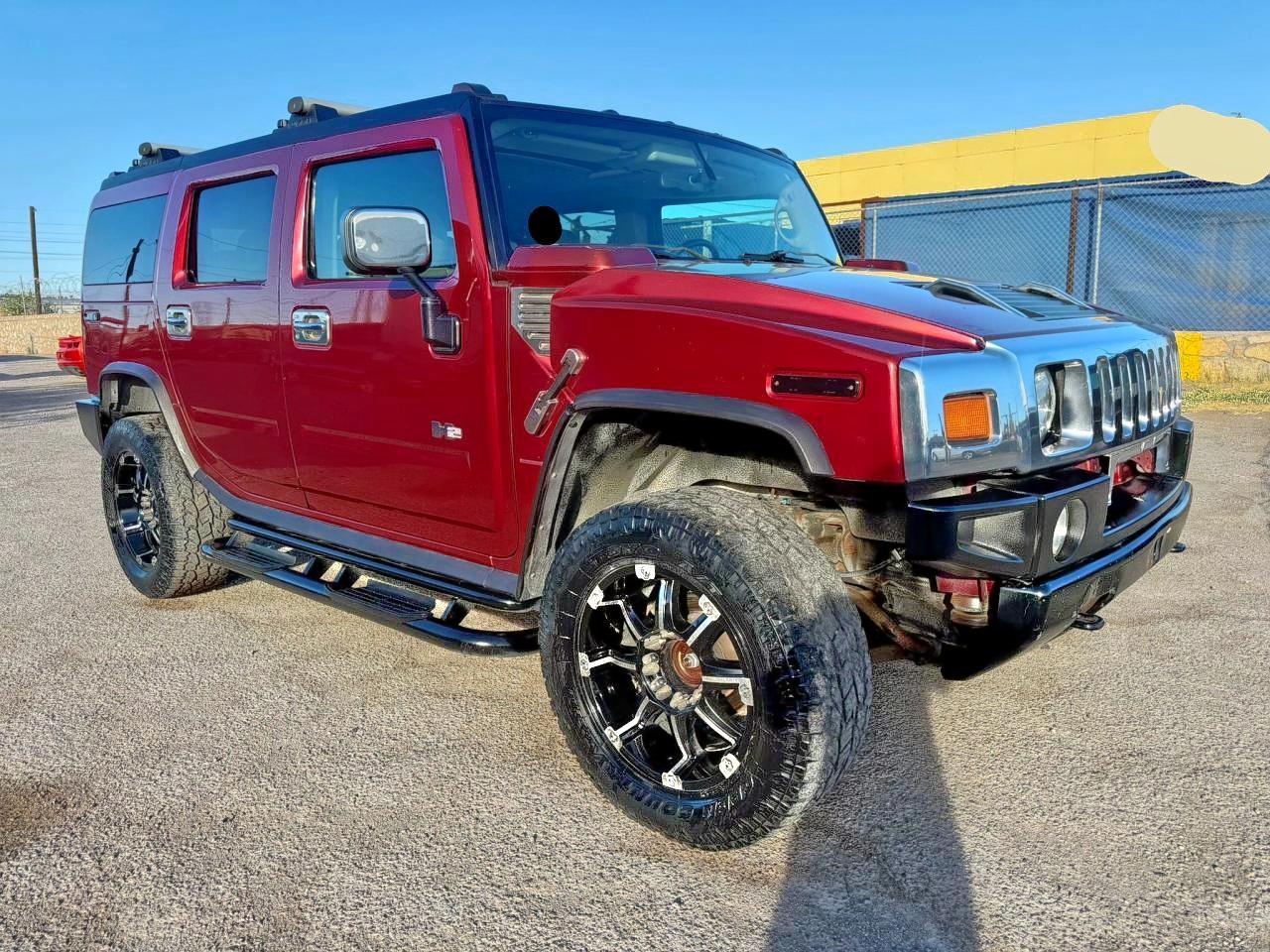 2003 Hummer H2, VIN 5GRGN23U73H128461 — Prior damage history
