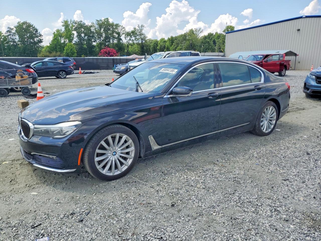 2016 BMW 7 Series 740i, VIN WBA7E2C50GGD99982 — Normal wear