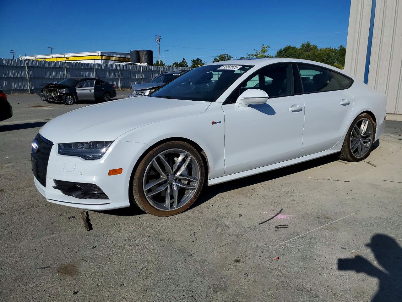 2016 Audi A7 Prestige, VIN WAU2GAFC9GN146788 — Side