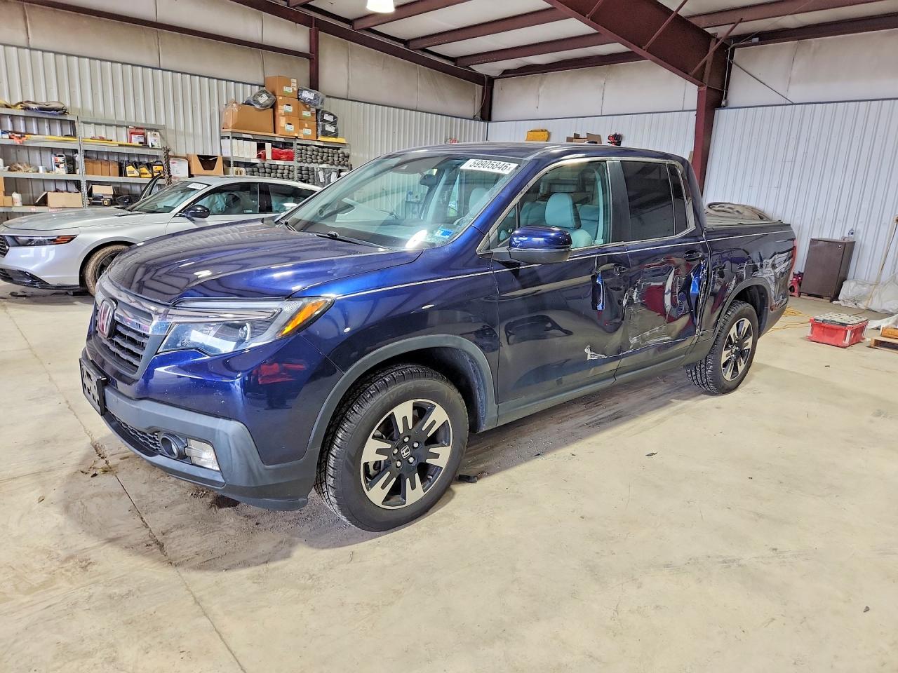 2020 Honda Ridgeline RTL, VIN 5FPYK3F58LB021077 — Side