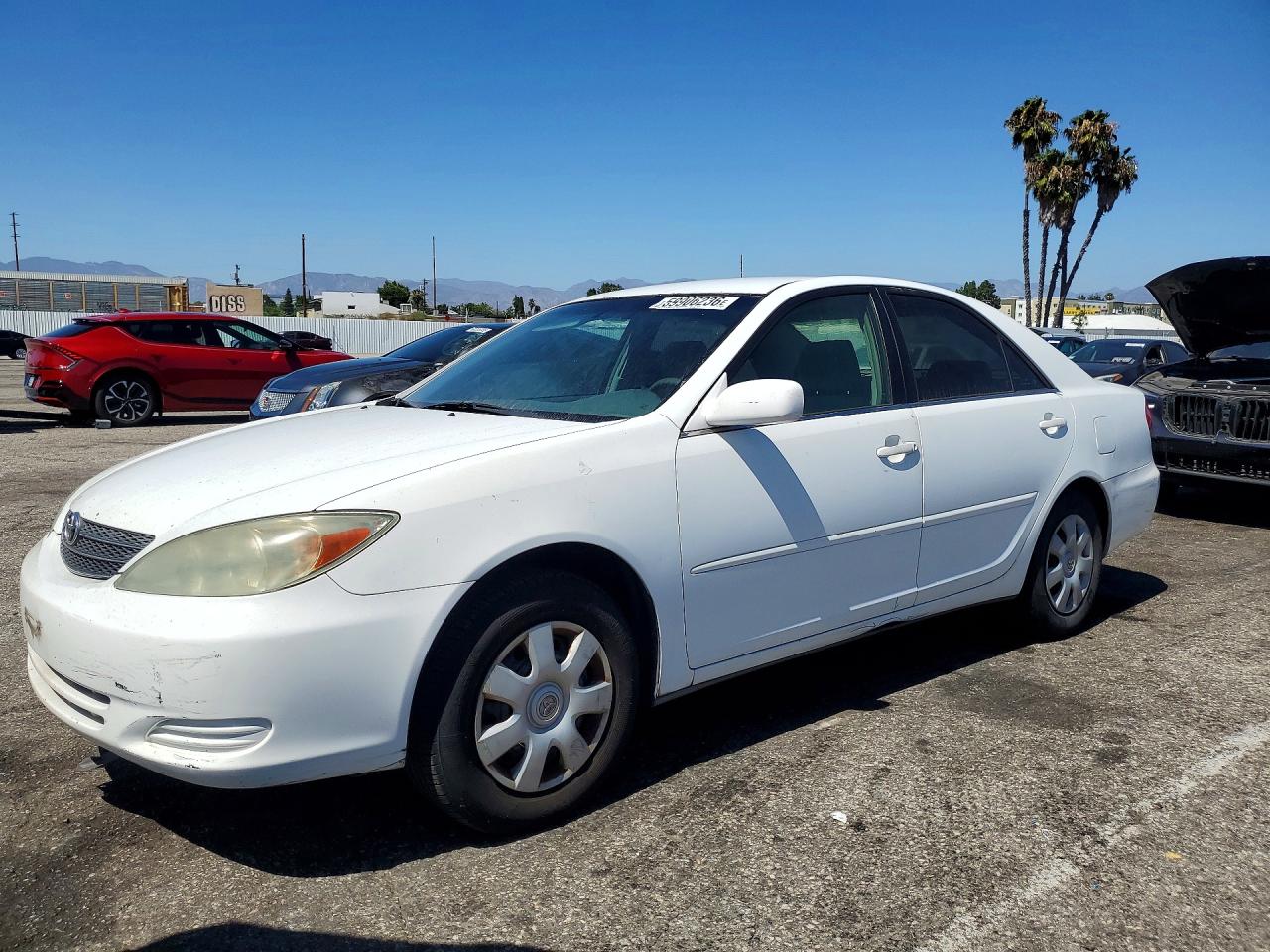 2003 Toyota Camry LE, VIN 4T1BE32K63U225526 — Vandalism