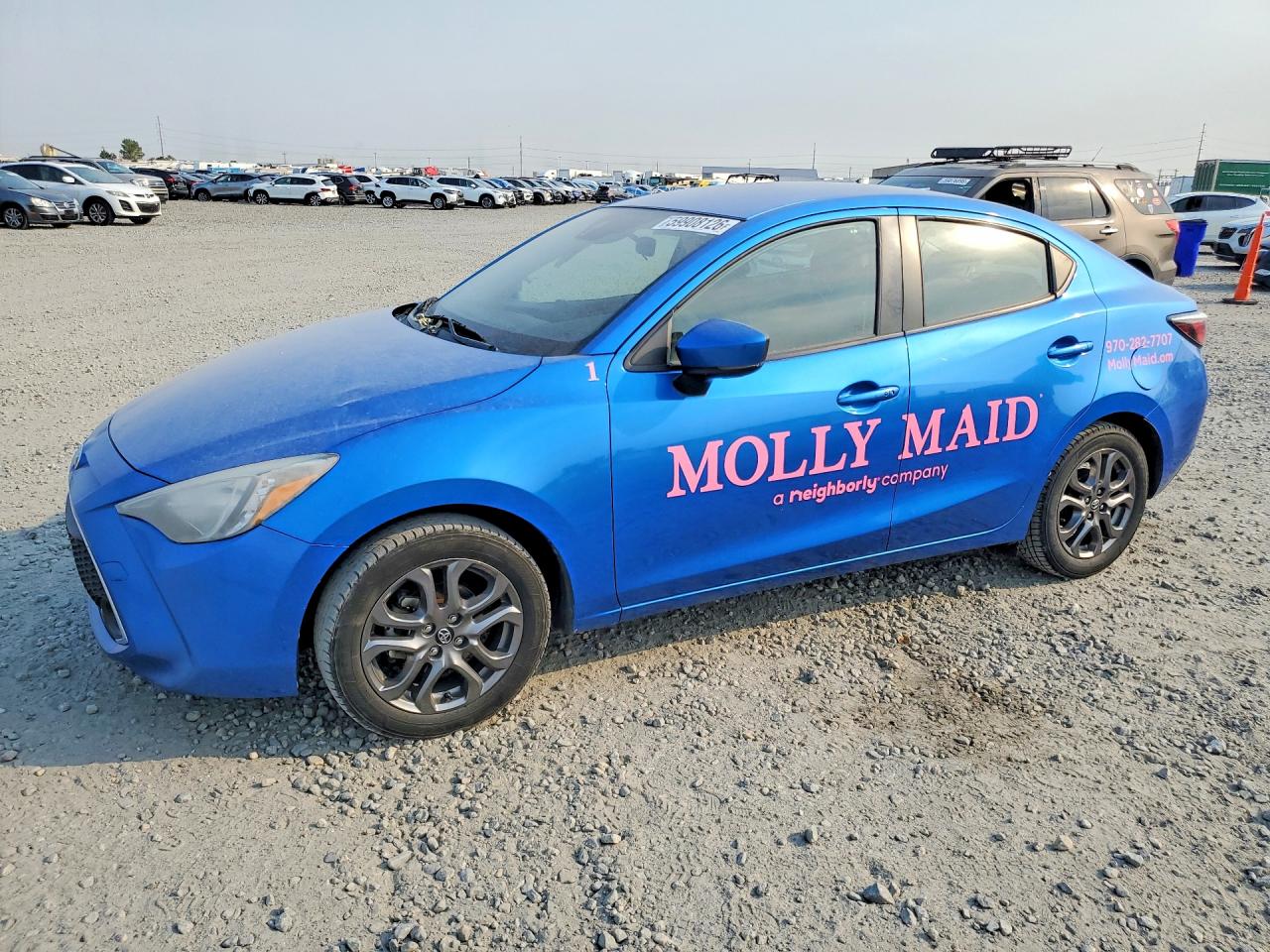 2019 Toyota Yaris L, VIN 3MYDLBYV3KY503651 — Side