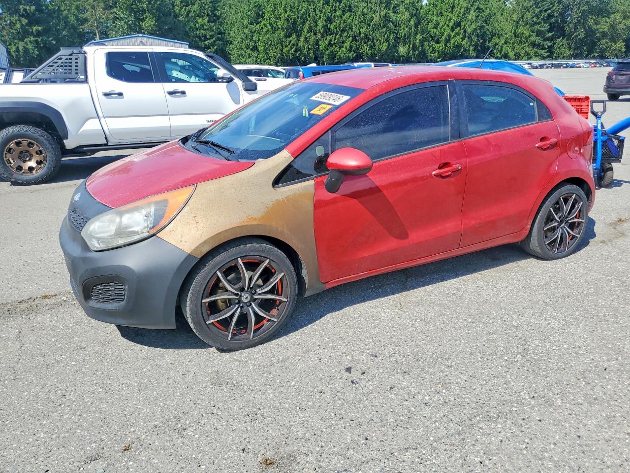 2013 Kia Rio LX, VIN KNADM5A34D6261739 — Side