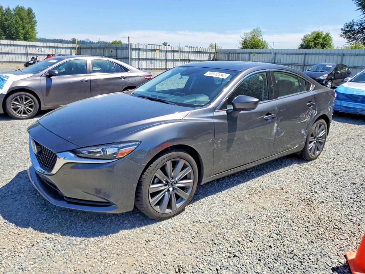 2020 Mazda 6 Touring, VIN JM1GL1VM9L1519957 — Зад