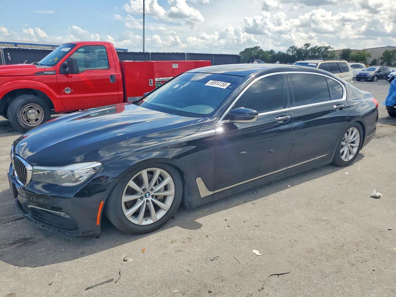 2018 BMW 7 Series 740i xDrive, VIN WBA7E4C50JGV23989 — Minor dents and scratches