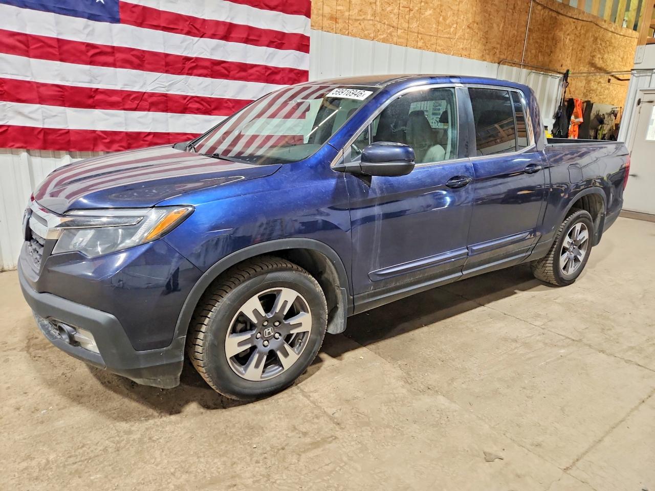 2017 Honda Ridgeline RTL-T, VIN 5FPYK3F67HB011690 — Minor dents and scratches