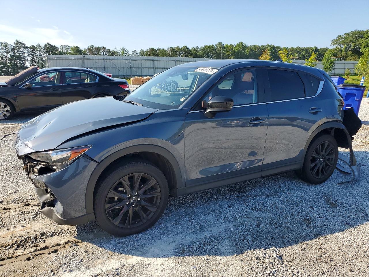 2021 Mazda CX-5 Carbon Edition, VIN JM3KFACM4M0383546 — Rear end