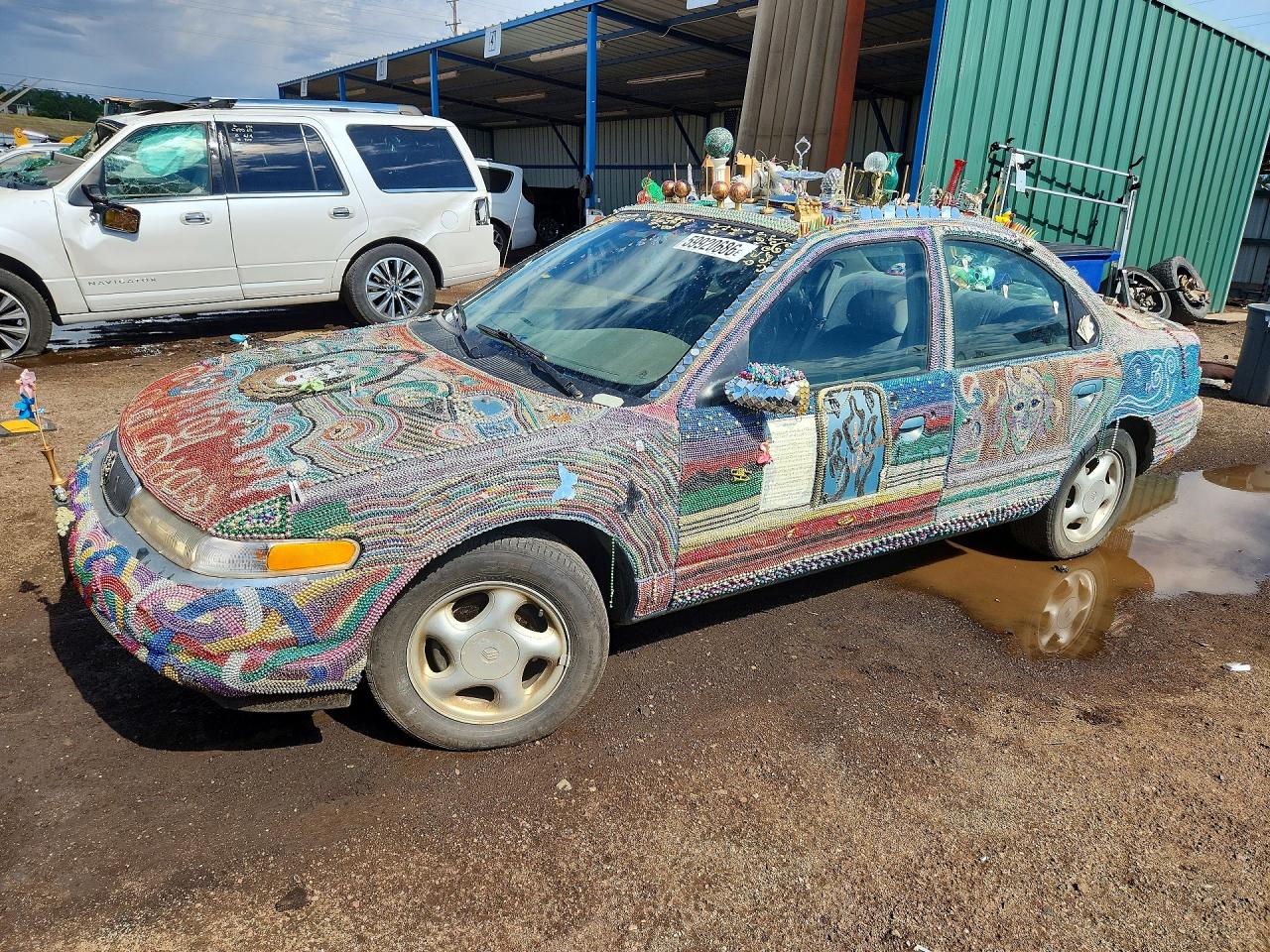 1997 Mercury Mystique, VIN 1MELM6530VK605203 — Minor dents and scratches