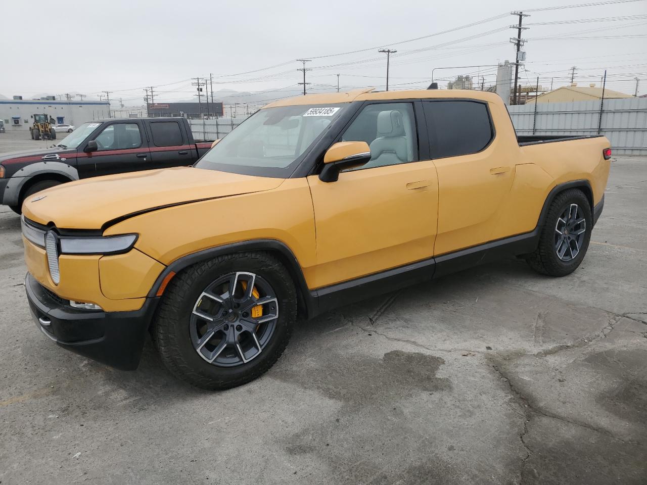 2022 Rivian R1T Launch Edition, VIN 7FCTGAAL2NN011755 — Side