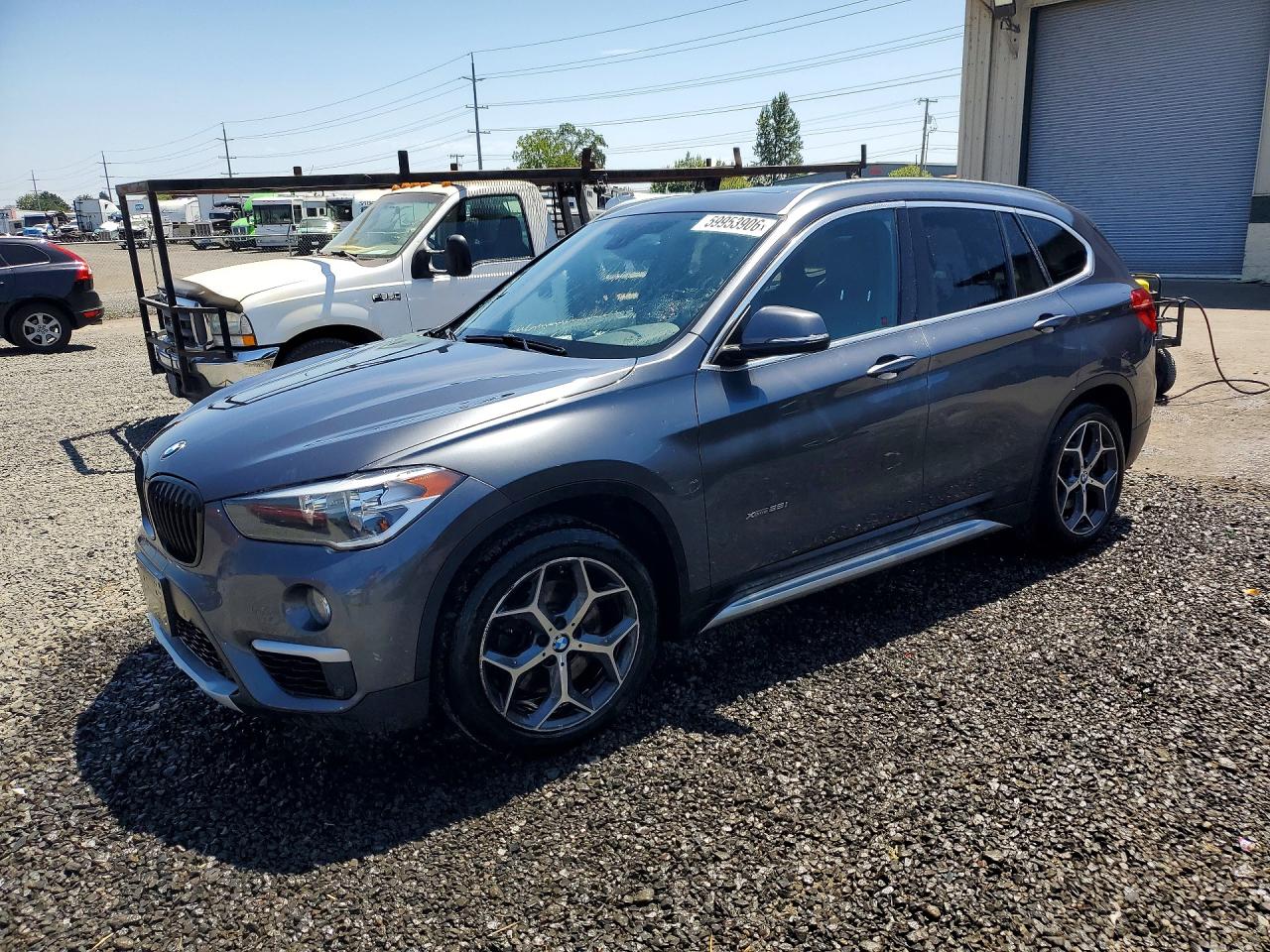 2016 BMW X1 xDrive28i, VIN WBXHT3C31G5F64616 — Minor dents and scratches