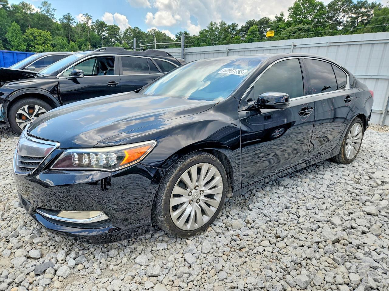 2014 Acura RLX Technology, VIN JH4KC1F54EC007059 — Side