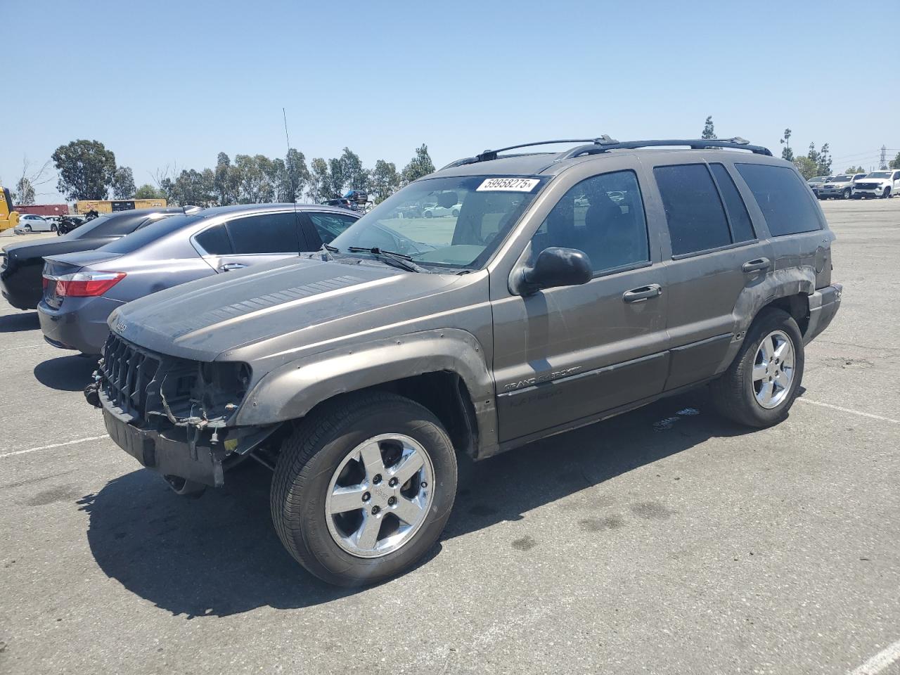 1999 Jeep Grand Cherokee Laredo, VIN 1J4GW58N5XC621540 — Rear end
