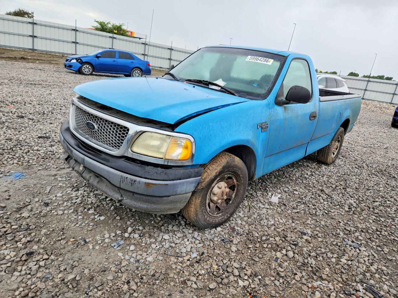 2002 Ford F-150 XL, VIN 1FTPF17L92NB43750 — Minor dents and scratches