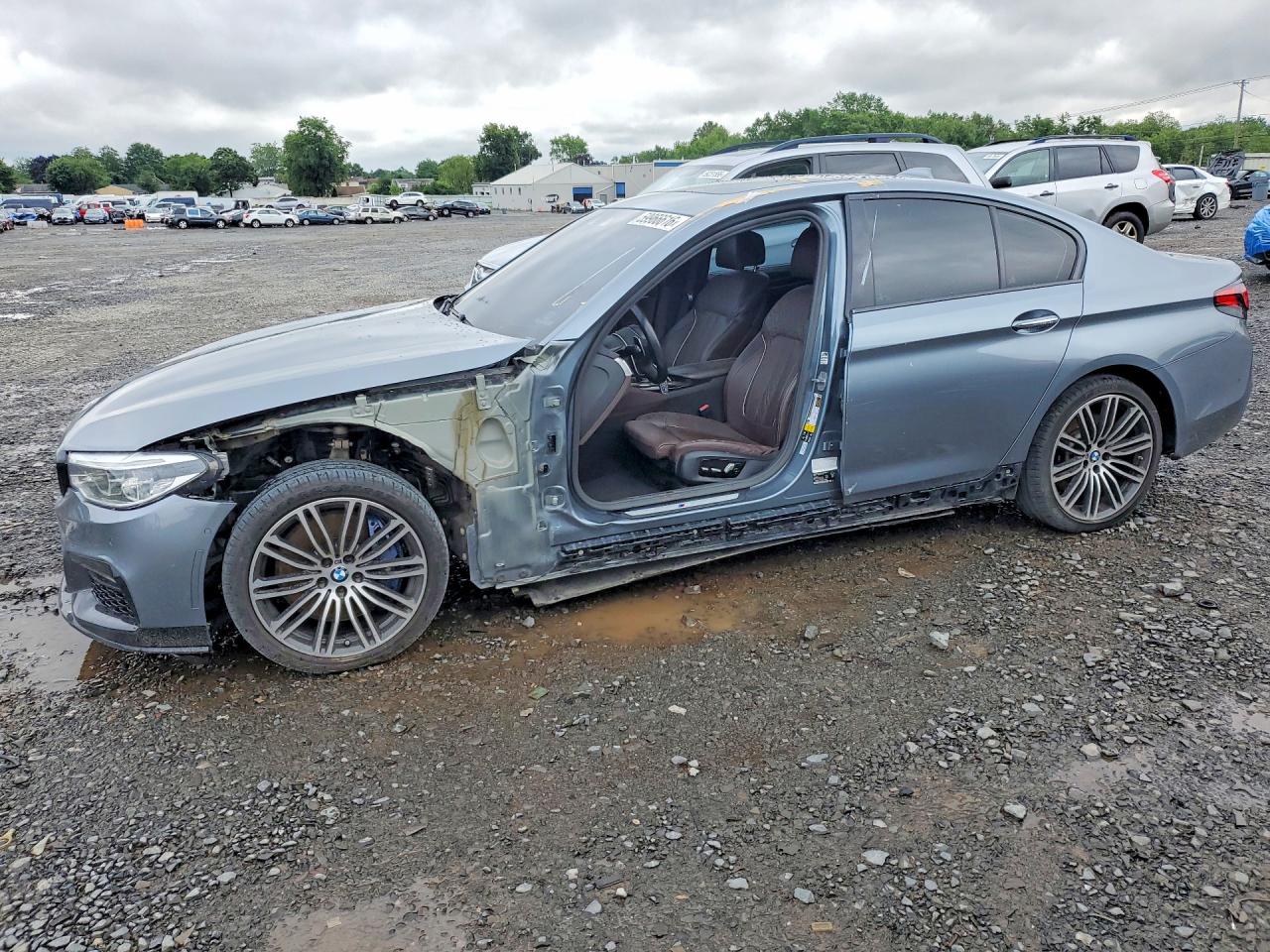 2018 BMW 5 Series 540i xDrive, VIN WBAJE7C53JWC55309 — Side