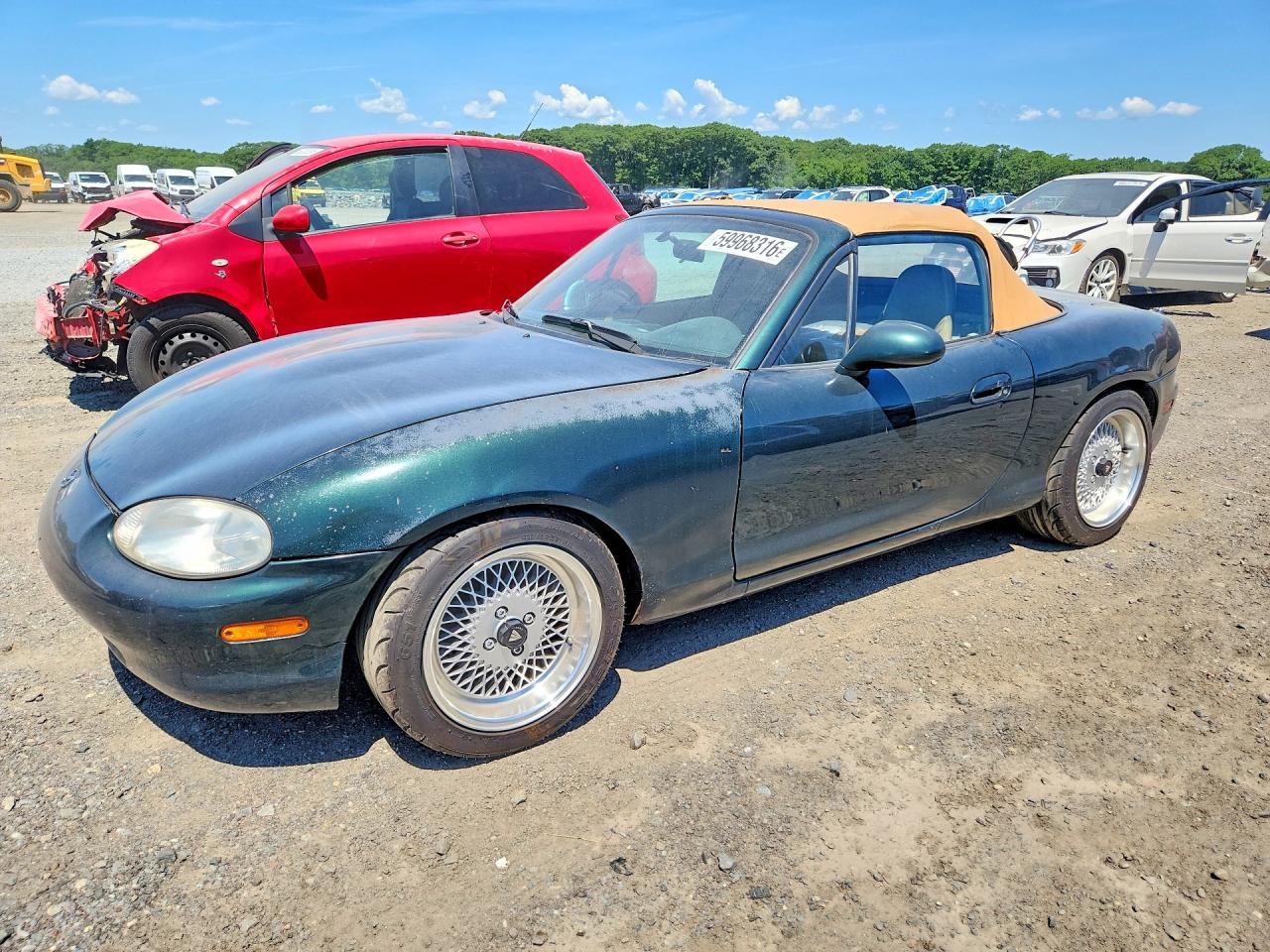 1999 Mazda MX-5 Miata, VIN JM1NB3534X0102755 — Rear end