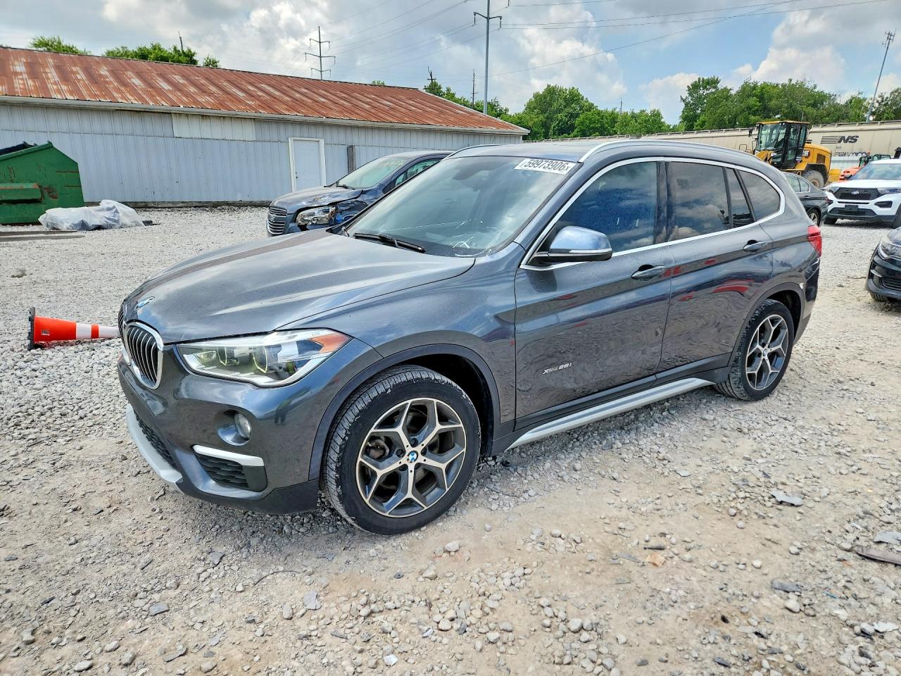 2018 BMW X1 xDrive28i, VIN WBXHT3C34J5K27989 — Rear end