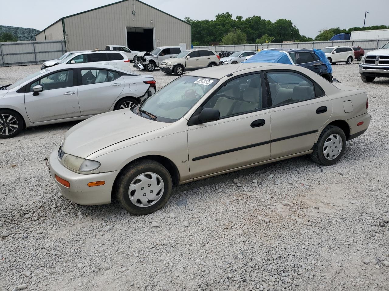 1996 Mazda Protege DX, VIN JM1BB141XT0342362 — Перед