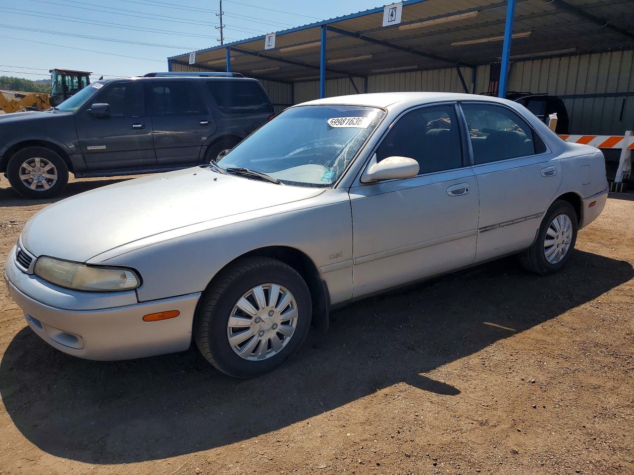1993 Mazda 626, VIN 1YVGE22A8P5238140 — Minor dents and scratches