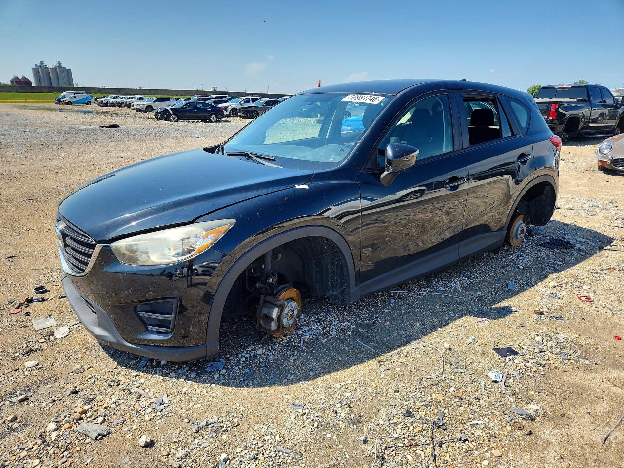 2016 Mazda CX-5 Sport, VIN JM3KE2BY3G0629990 — Stripped