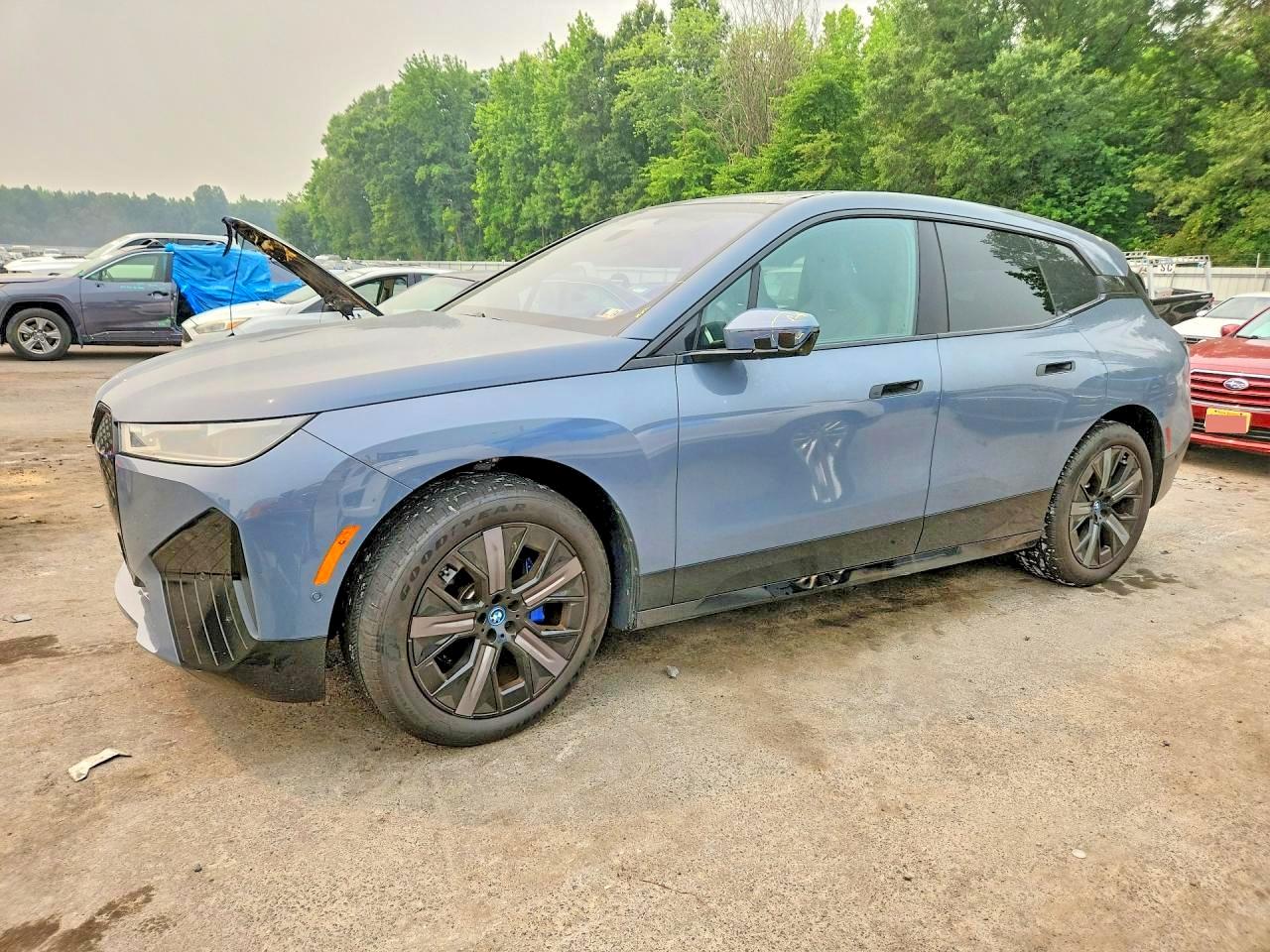 2024 BMW iX xDrive50, VIN WB523CF02RCP02238 — Rear end
