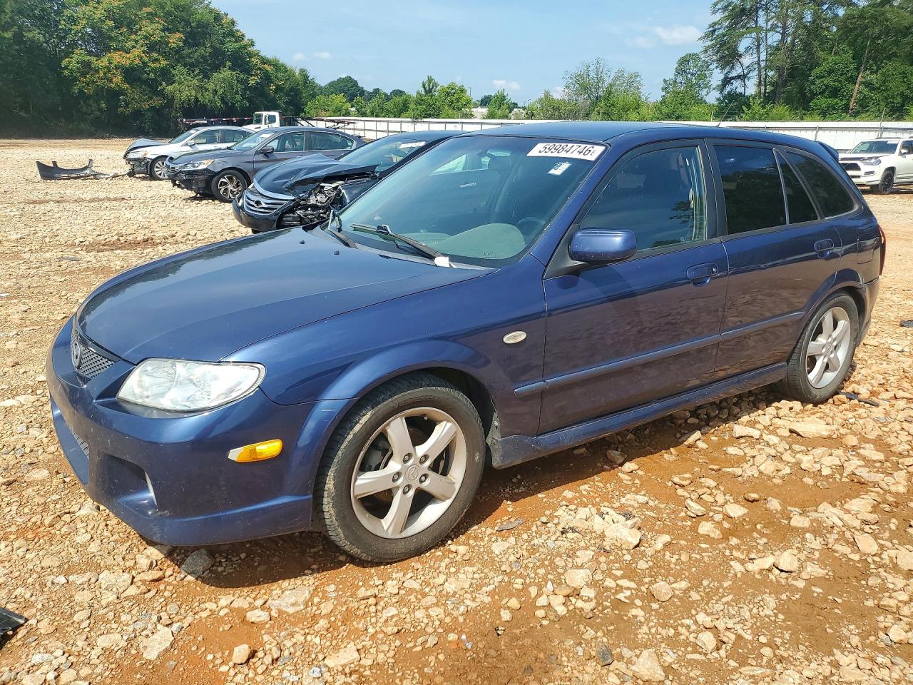 2003 Mazda Protege, VIN JM1BJ245431194540 — Rear end