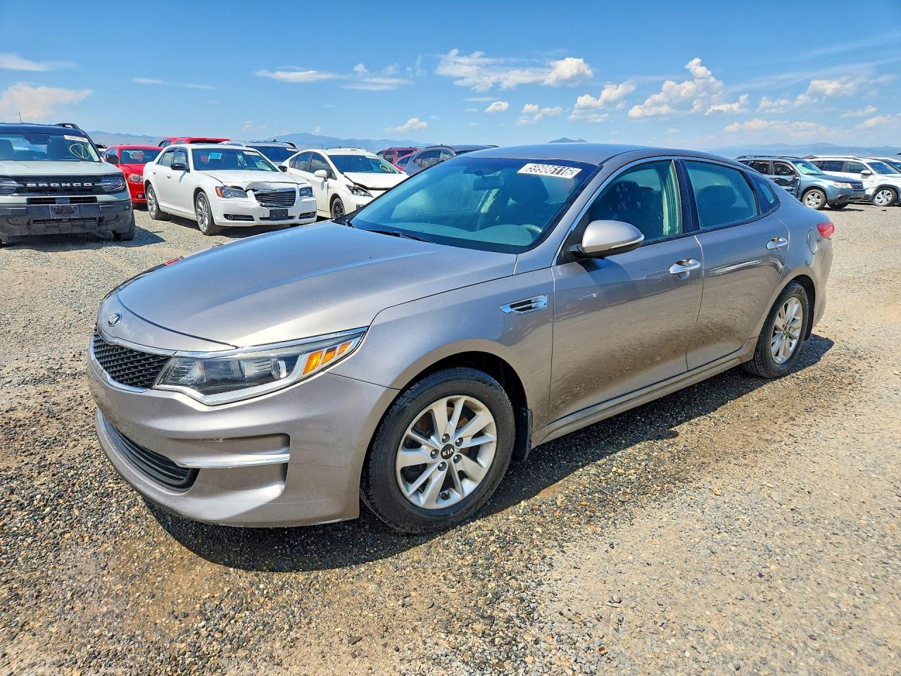 2016 Kia Optima LX, VIN 5XXGT4L33GG071916 — Side