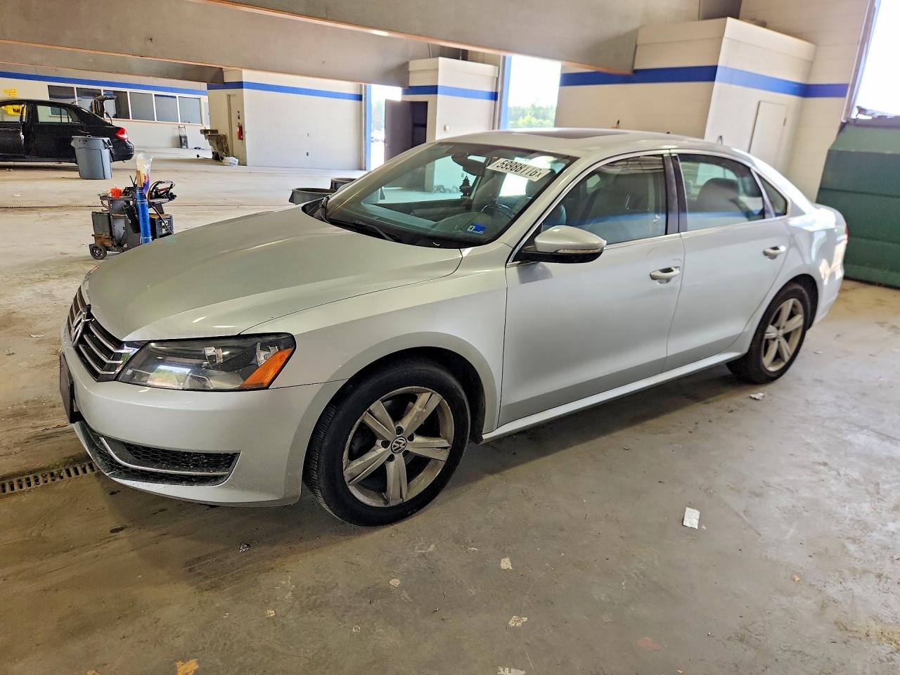 2012 Volkswagen Passat SE, VIN 1VWBH7A39CC081132 — Side