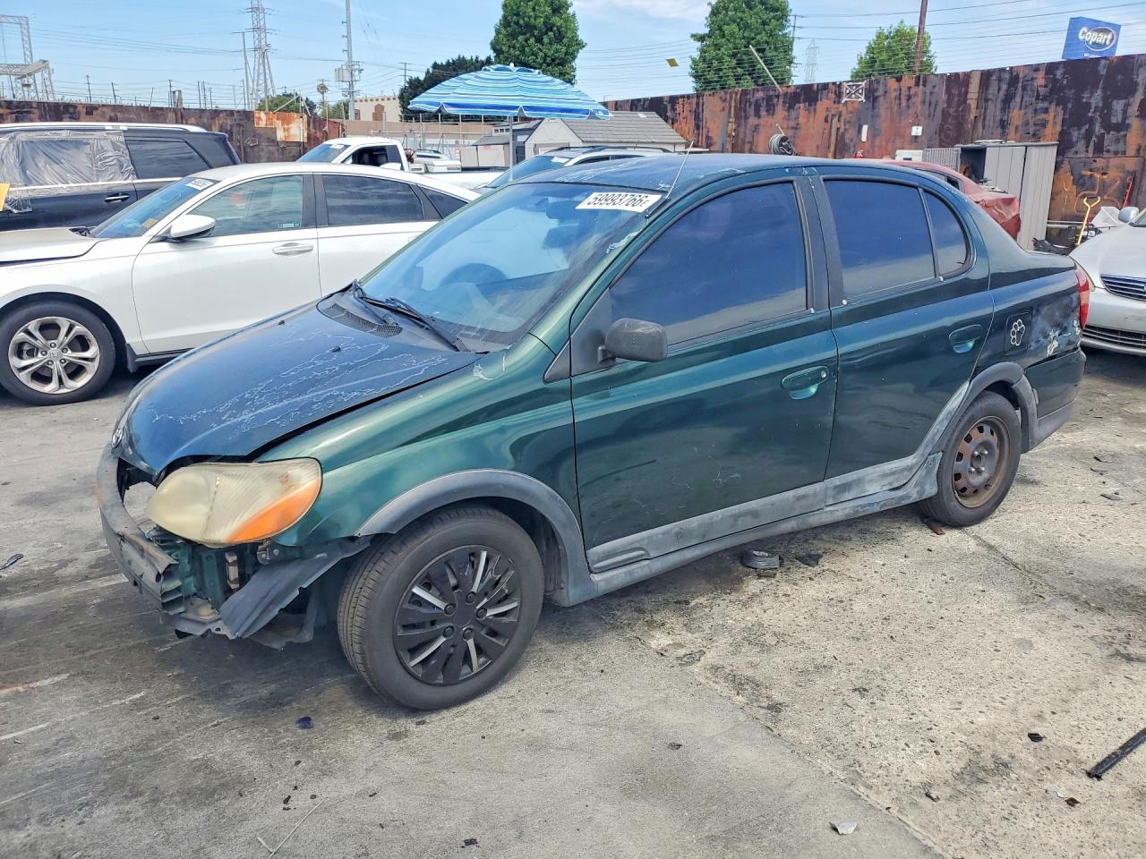 2001 Toyota ECHO, VIN JTDBT123810172341 — Перед