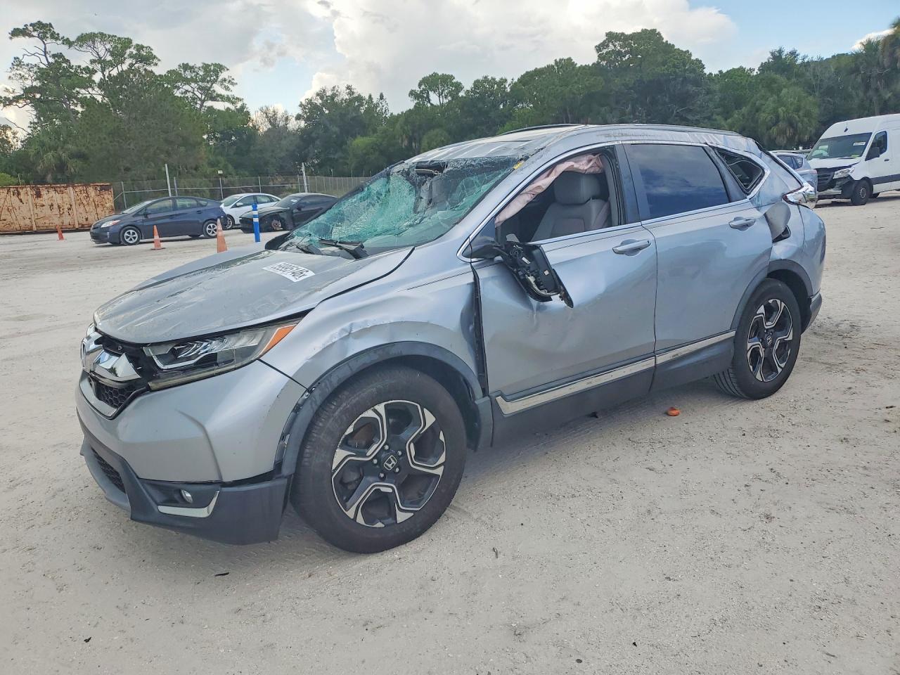 2018 Honda CR-V Touring, VIN 7FARW1H95JE040824 — Rollover