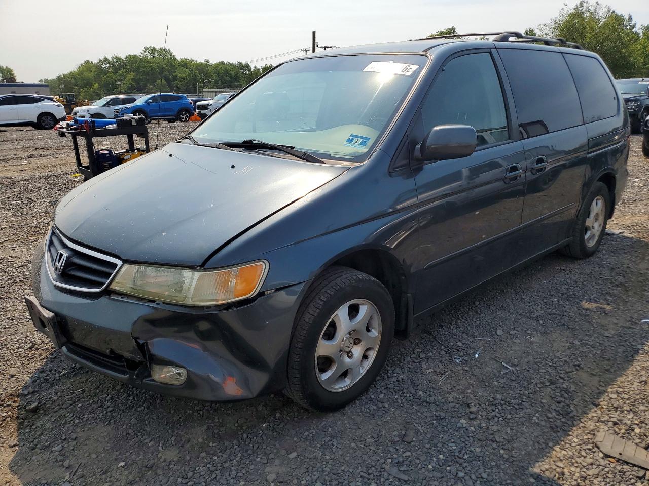 2003 Honda Odyssey EX-L, VIN 5FNRL18923B032350 — Front end
