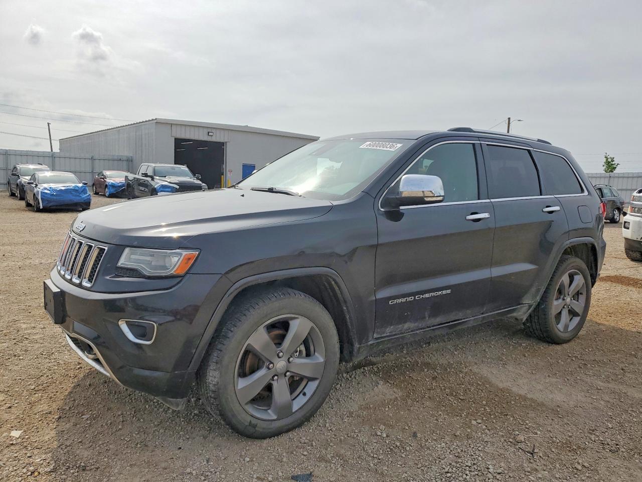 2014 Jeep Grand Cherokee Overland, VIN 1C4RJFCG7EC195813 — Front end