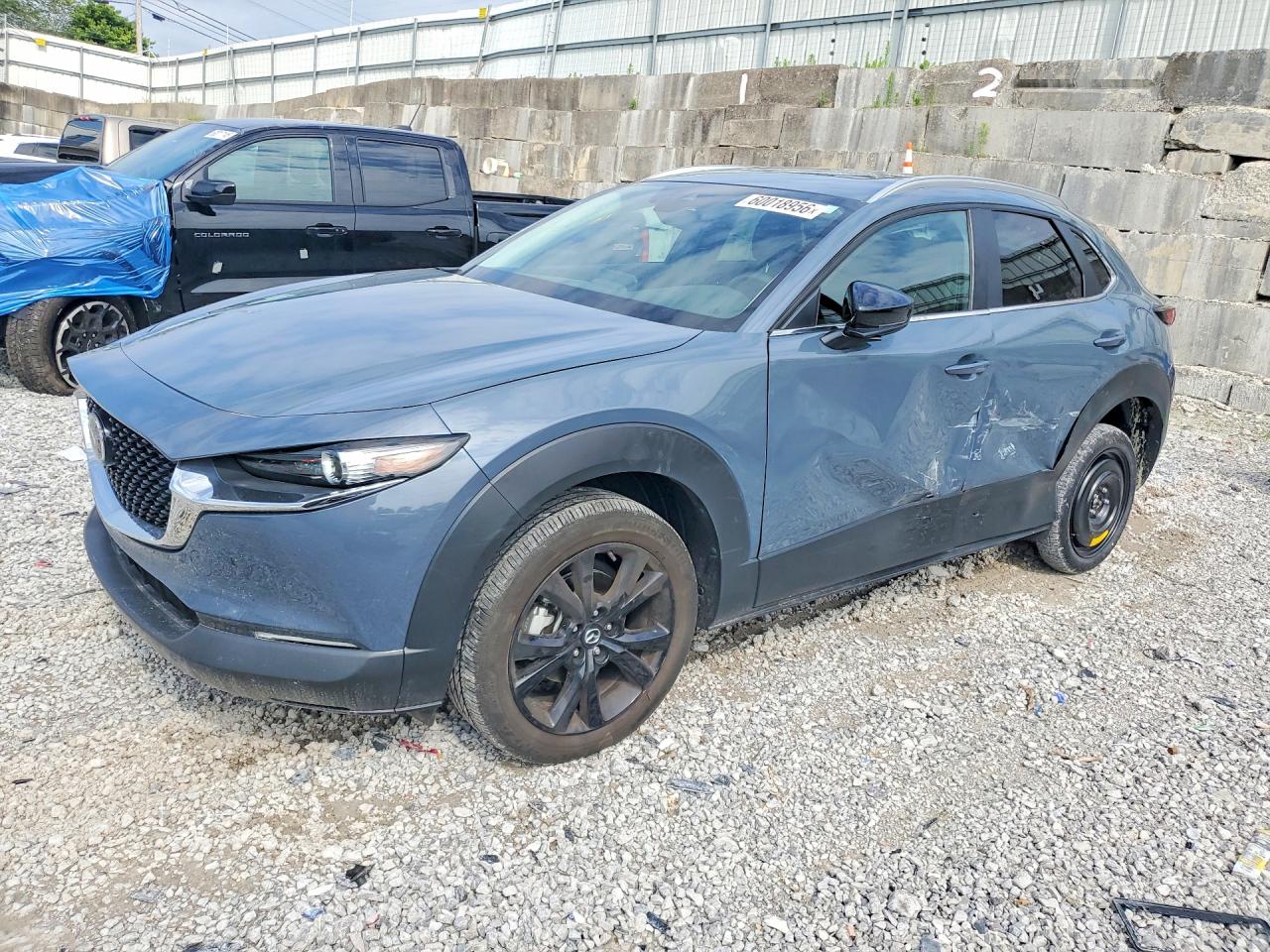 2022 Mazda CX-30 S Carbon Edition, VIN 3MVDMBCL3NM403447 — Side