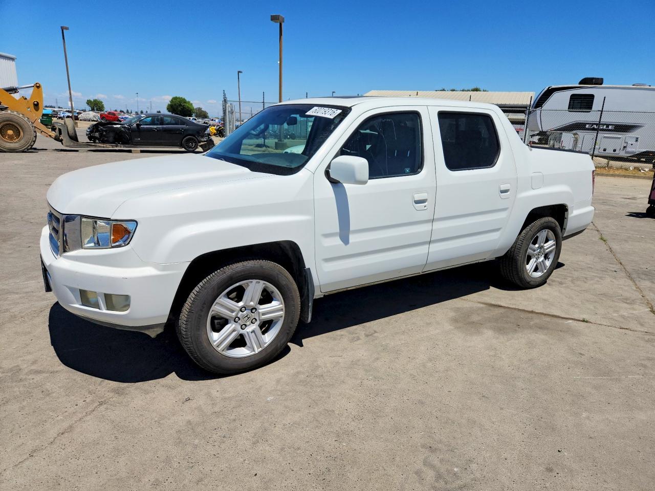 2009 Honda Ridgeline RTL, VIN 5FPYK165X9B107875 — Rear end