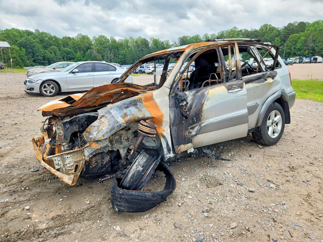 2005 Toyota RAV4, VIN JTEHD20V650050242 — Burn