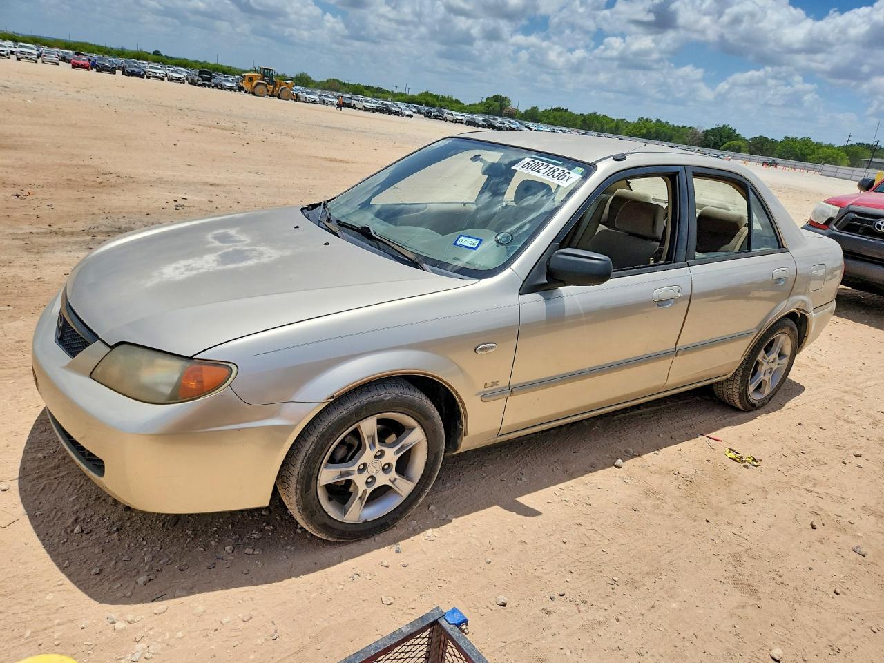 2003 Mazda Protege DX, VIN JM1BJ225731198746 — Мелкие вмятины и царапины