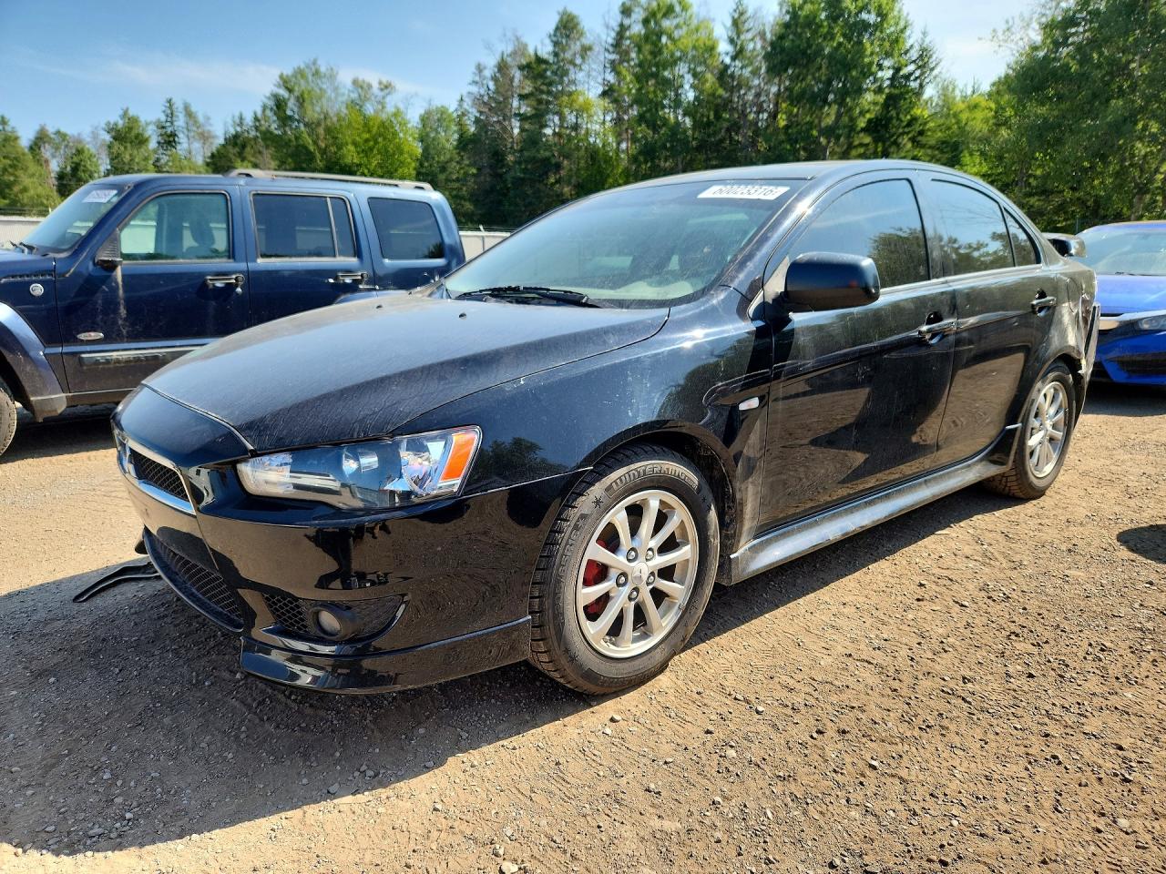 2011 Mitsubishi Lancer ES, VIN JA32U2FU8BU610421 — Rear end