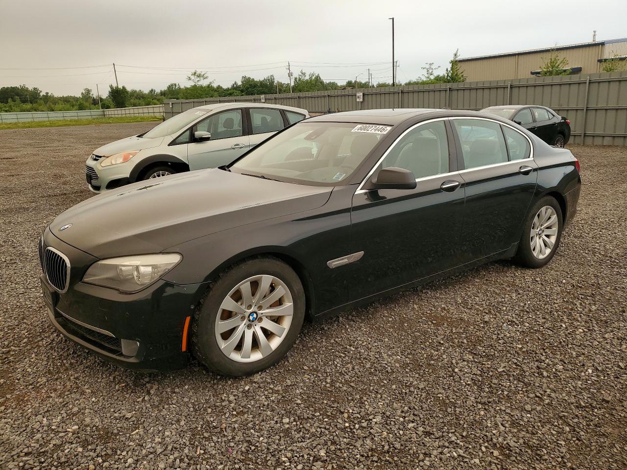 2009 BMW 7 Series 750i, VIN WBAKA83529CY33514 — Вода / потоп
