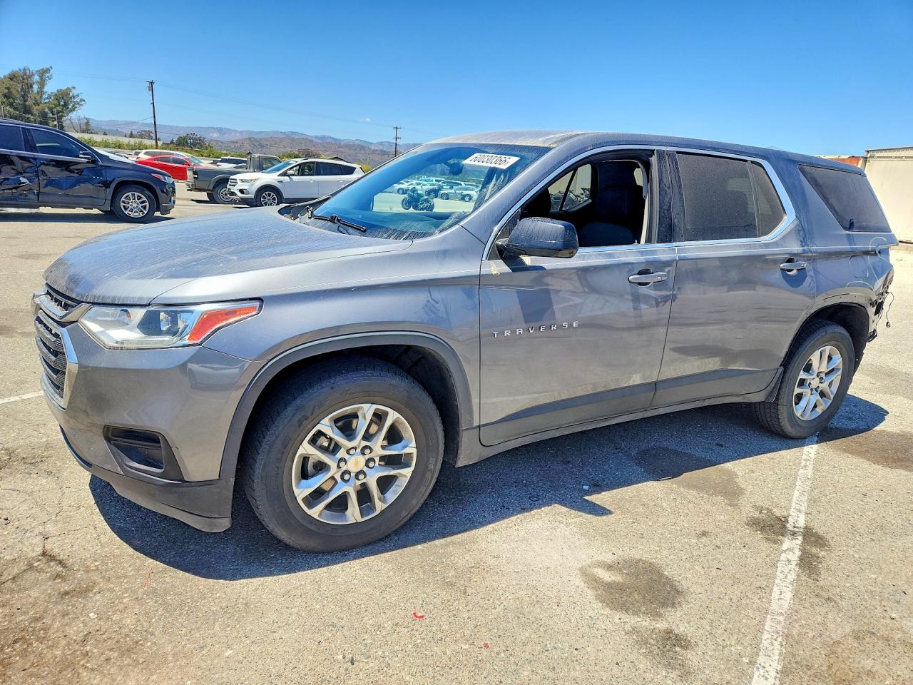 2019 Chevrolet Traverse LS, VIN 1GNERFKW9KJ117242 — Rear end