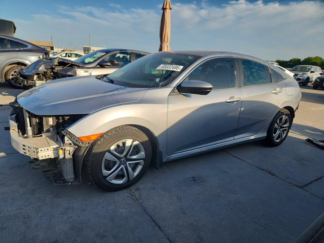 2018 Honda Civic LX, VIN 19XFC2F56JE014719 — Front end