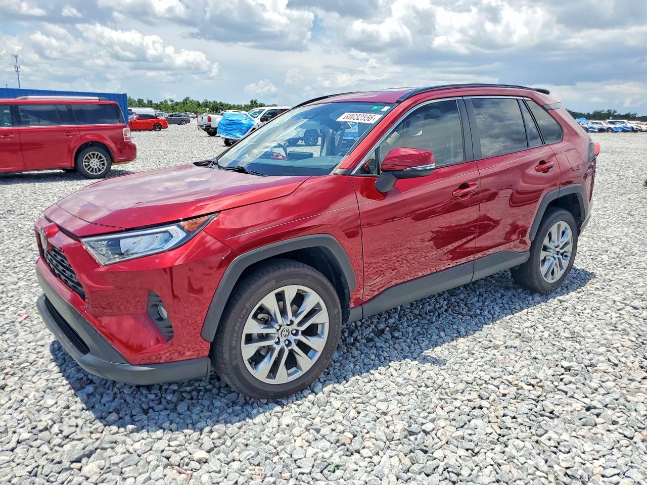 2020 Toyota RAV4 XLE Premium, VIN JTMC1RFV2LD521218 — Side