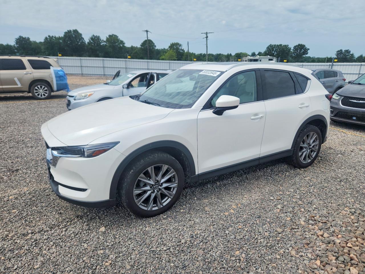 2021 Mazda CX-5 Grand Touring, VIN JM3KFBDM7M1442510 — Water / flood
