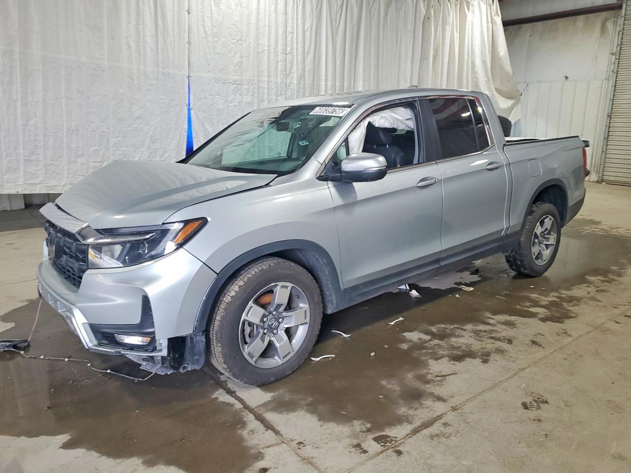 2025 Honda Ridgeline RTL, VIN 5FPYK3F58SB041974 — Front end