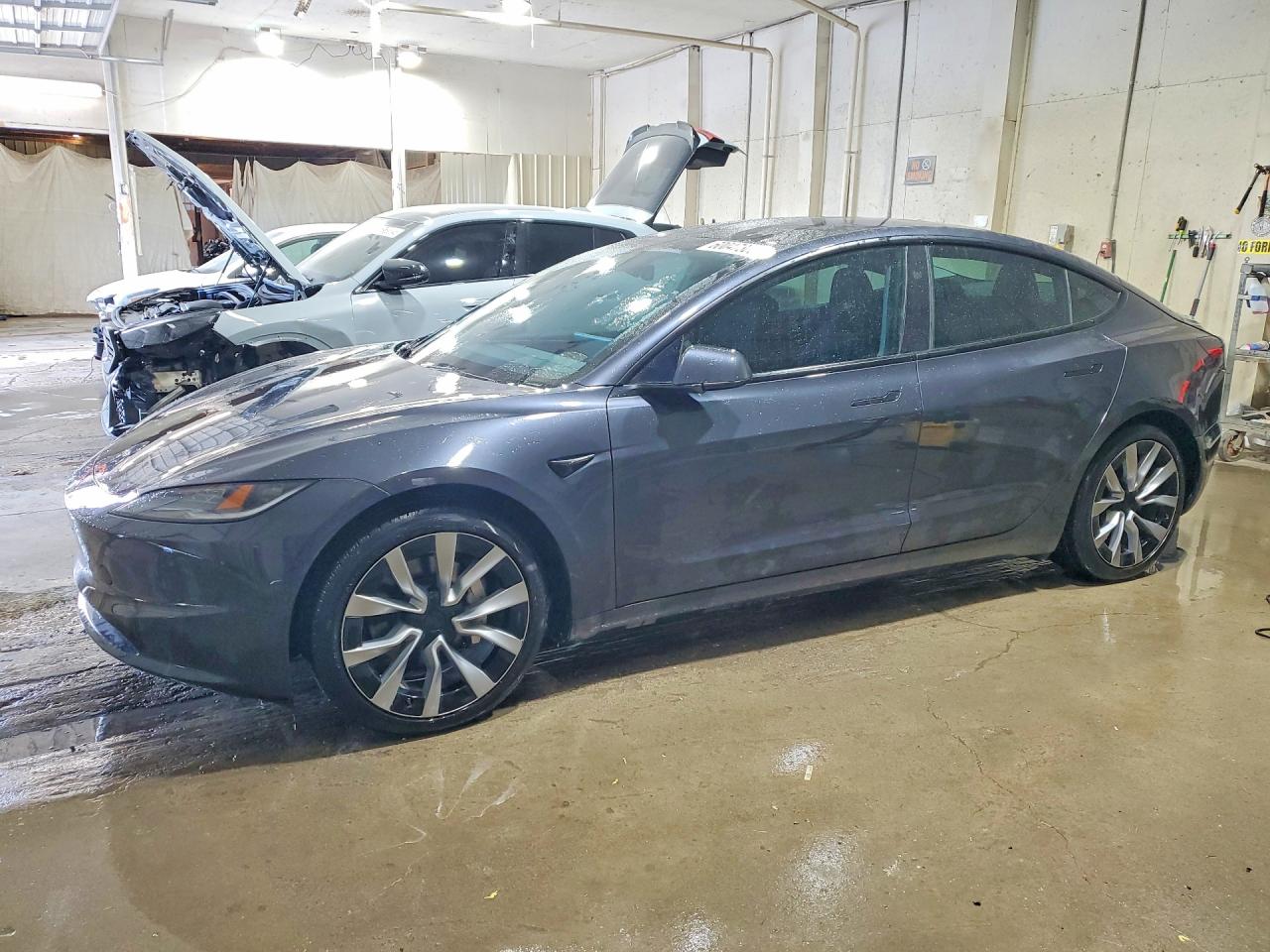 2024 Tesla Model 3 Long Range, VIN 5YJ3E1EB9RF736593 — Water / flood