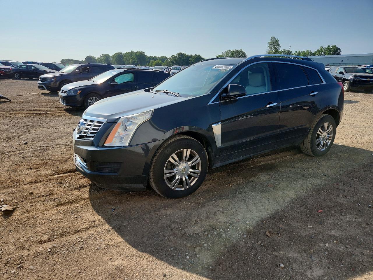 2015 Cadillac SRX Luxury Collection, VIN 3GYFNEE30FS536633 — Front end