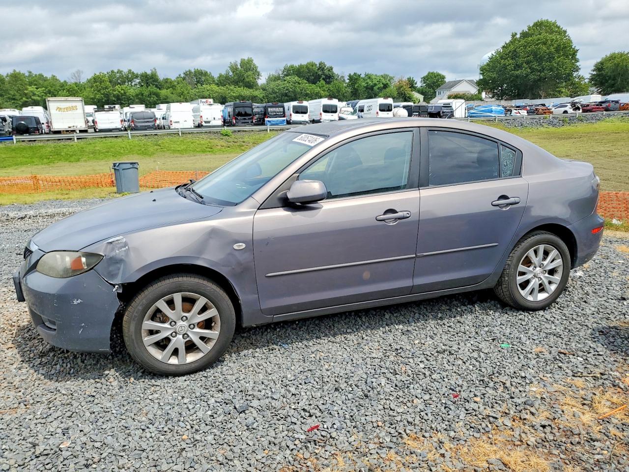 2007 Mazda 3 i Touring, VIN JM1BK32F171659151 — Side