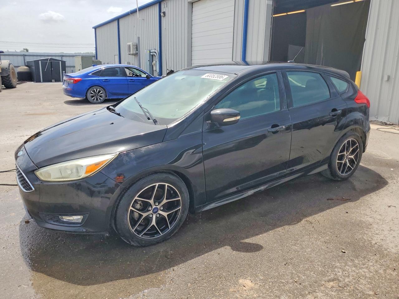 2015 Ford Focus SE, VIN 1FADP3K25FL340514 — Minor dents and scratches