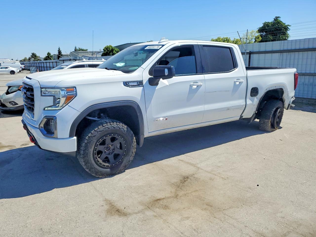 2021 GMC Sierra 1500 AT4, VIN 3GTU9EETXMG324484 — Side
