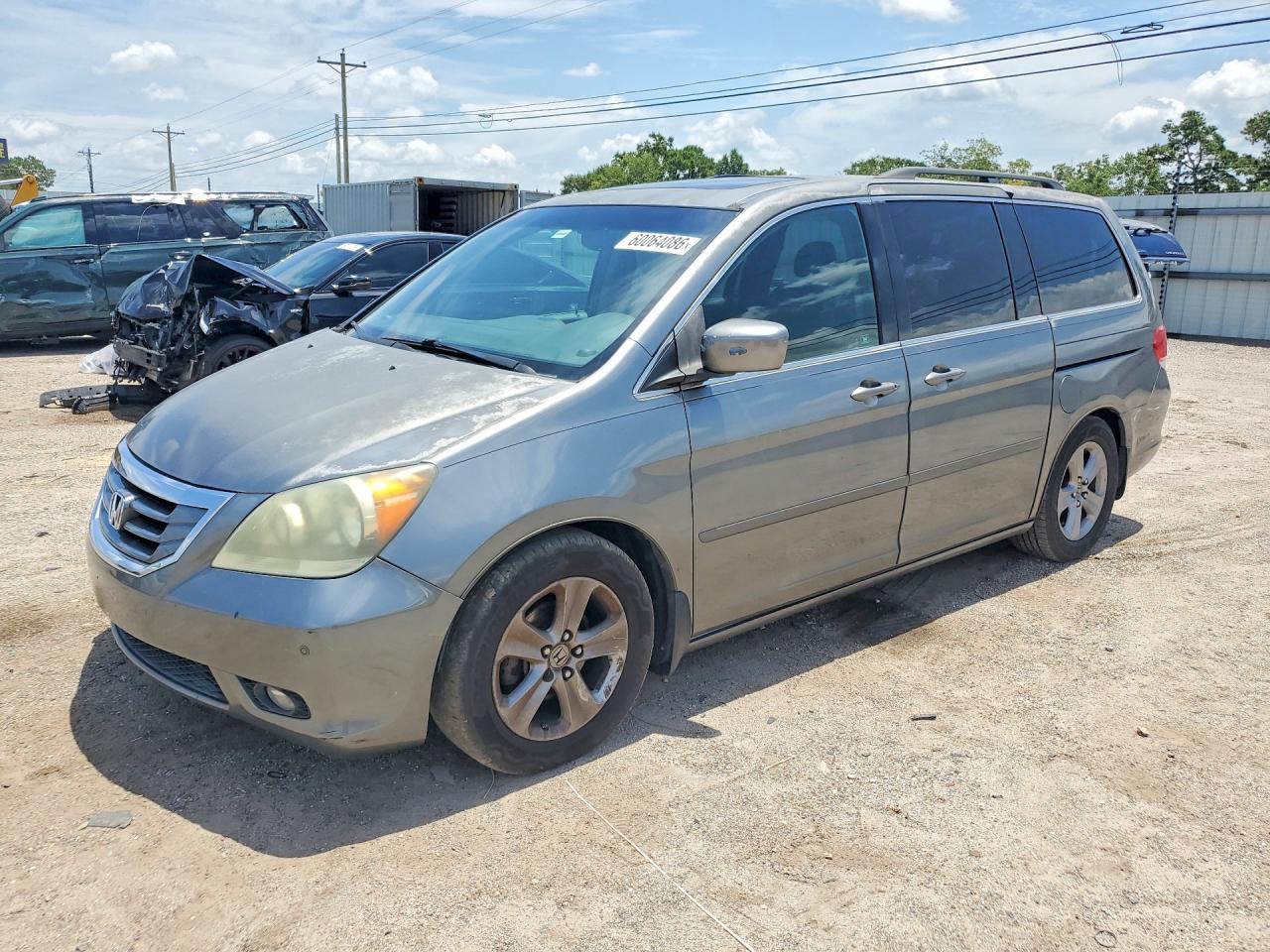 2009 Honda Odyssey Touring, VIN 5FNRL38979B044031 — Front end